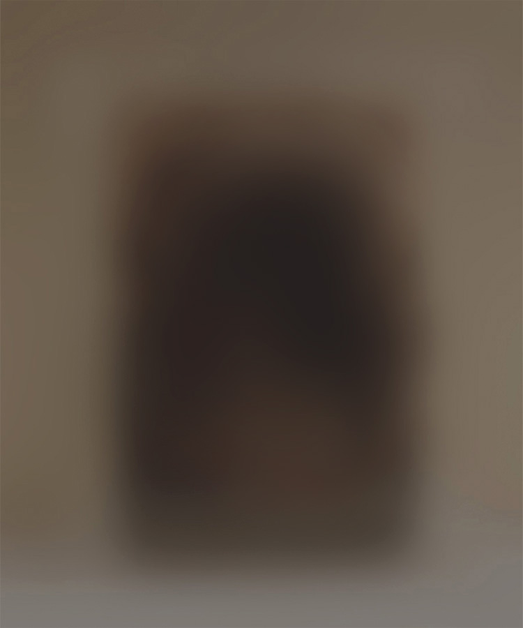 Imagem Borrada que sugere uma escultura em caixa acrílica